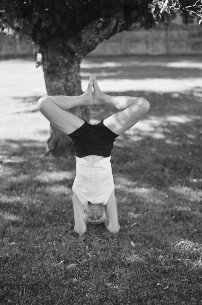 woman doing a headstand