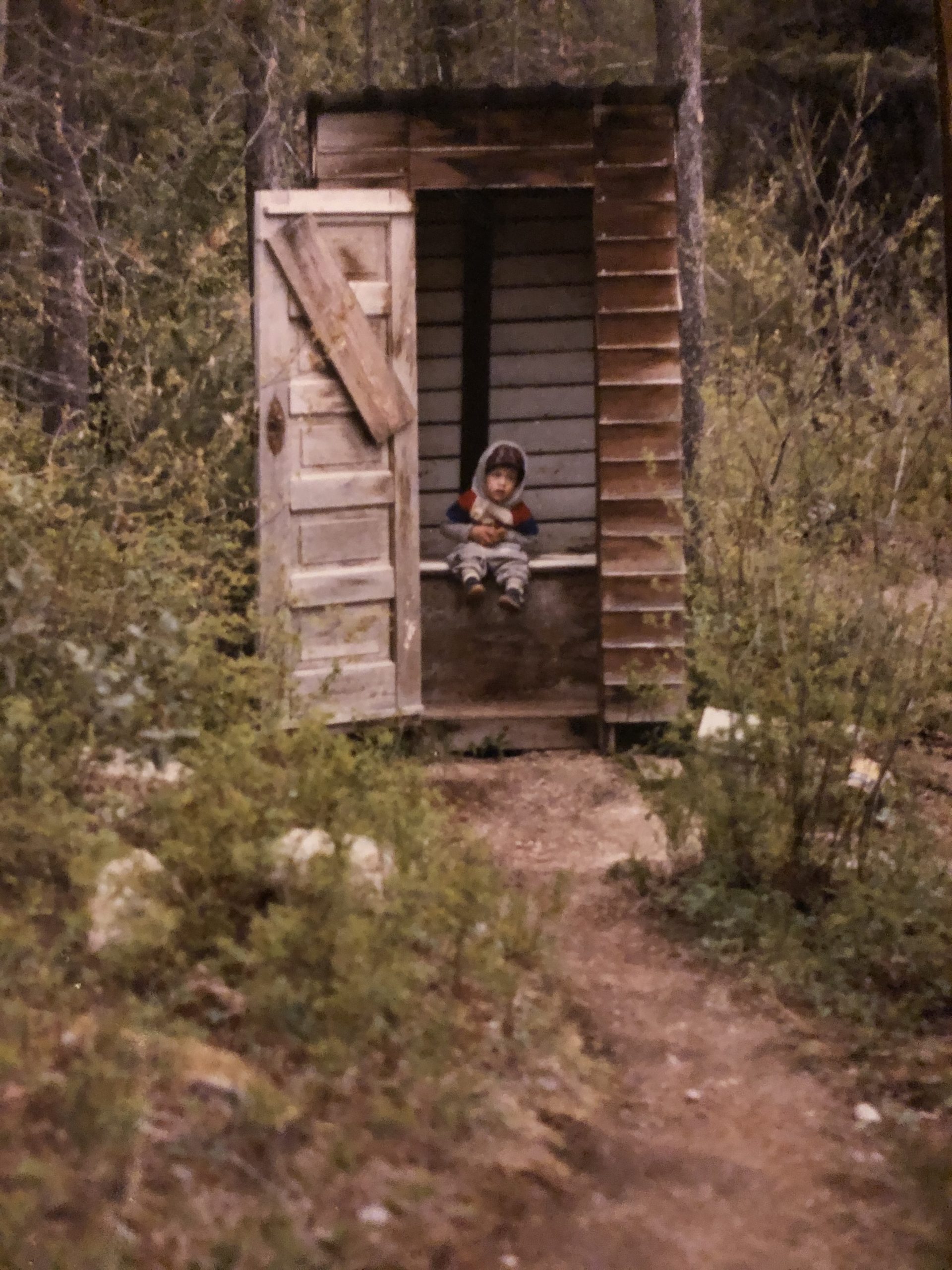 outhouse in the woods