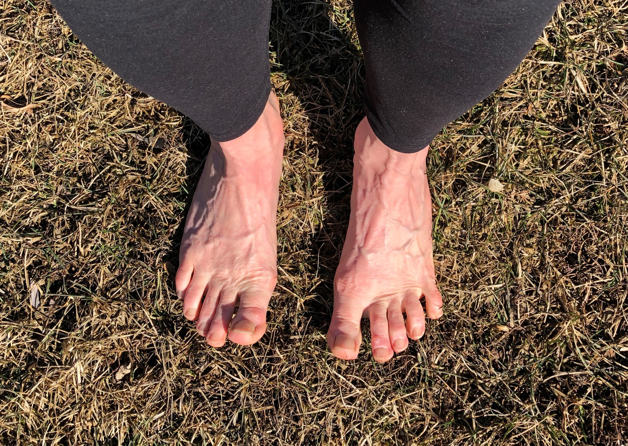 feet in the grass