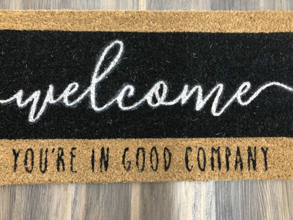 mat saying welcome, you're in good company