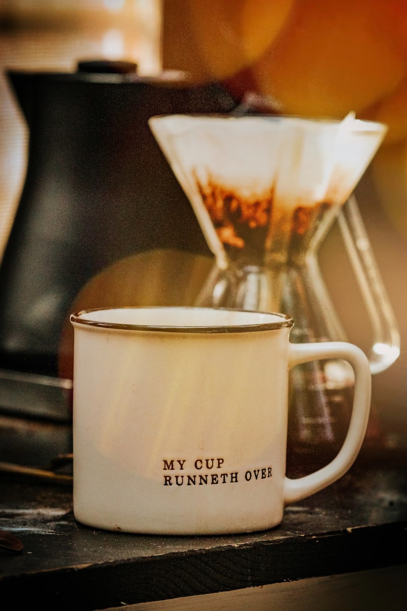 white ceramic mug with coffee